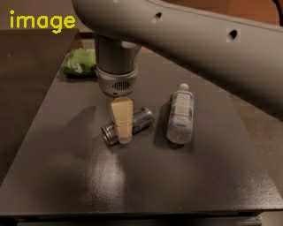 Same robot scene after a subtle exposure shift